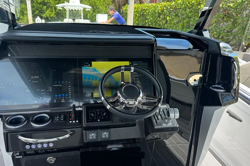 Slide: The Image of 2024 Nor-Tech 400 Supersport dashboard with advanced navigation and control systems. - 25