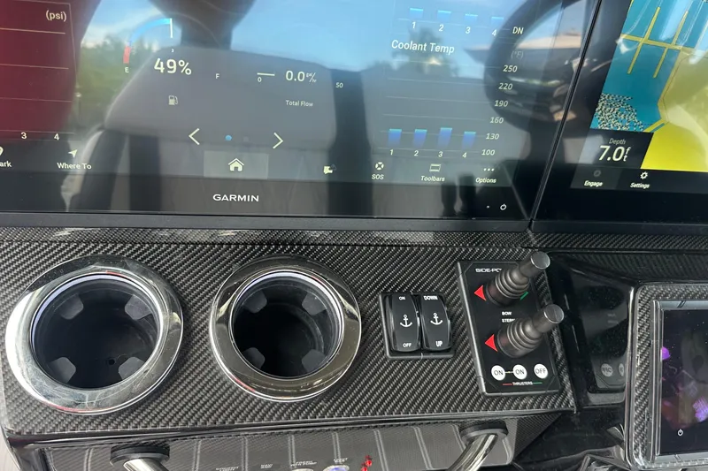 Slide: The Image of Dashboard of 2024 Nor-Tech 400 Supersport with Garmin displays and controls. - 28