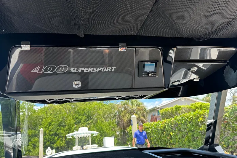 Slide: The Image of 2024 Nor-Tech 400 Supersport dashboard with carbon fiber finish and JL Audio system. - 33