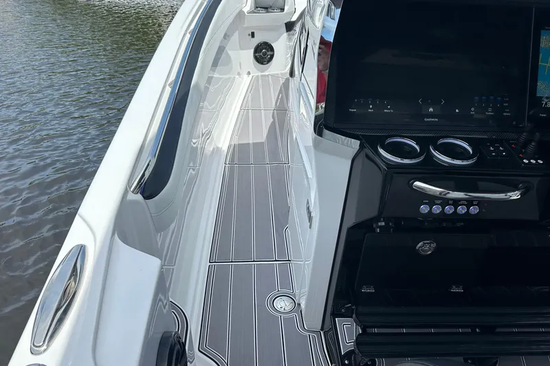 Slide: The Image of 2024 Nor-Tech 400 Supersport boat interior with sleek design and advanced controls. - 35