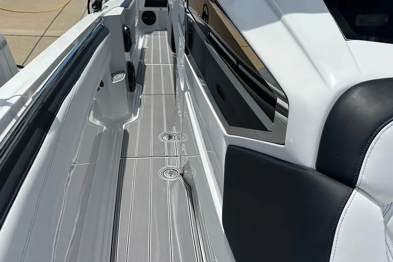 Slide: The Image of 2024 Nor-Tech 400 Supersport boat interior with sleek seating and modern design. - 47