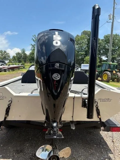 Slide: The Image of 2024 Tracker Pro Team 195 TXW Tournament Edition boat with 150 HP engine, rear view. - 5
