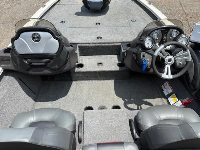 Slide: The Image of 2024 Tracker Pro Team 195 TXW Tournament Edition boat interior with dual consoles and seating. - 8