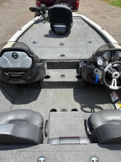 Slide: The Image of 2024 Tracker Pro Team 195 TXW Tournament Edition boat interior with dual consoles and seating. - 9