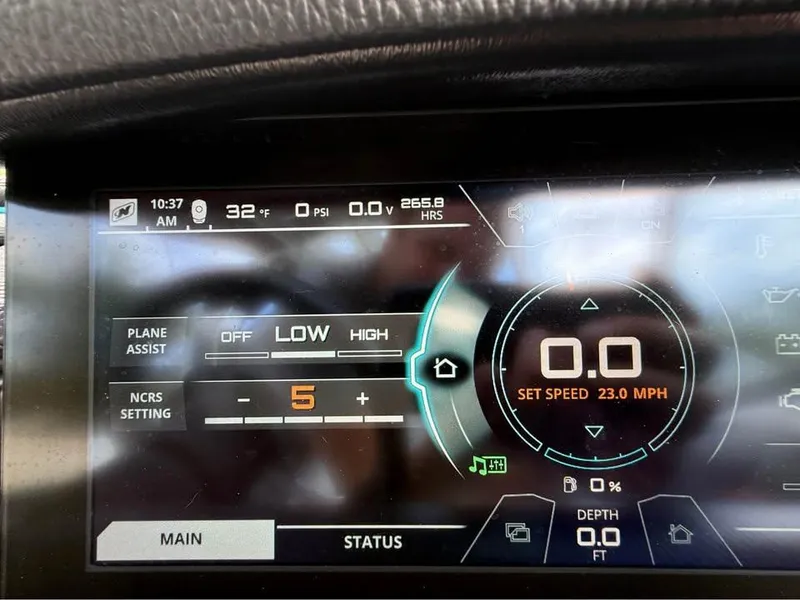 Slide: The Image of Dashboard of 2020 Nautique Super Air Nautique G21 showing speed and settings. - 16