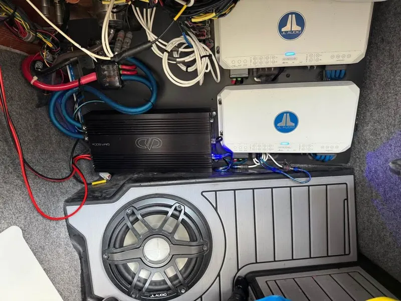 Slide: The Image of 2020 Nautique Super Air Nautique G21 audio system with JL Audio amplifiers and subwoofer. - 19