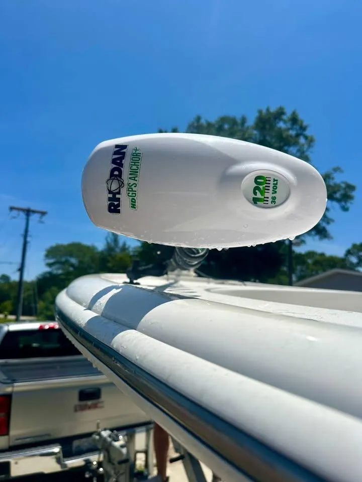 Slide: The Image of Rhoden GPS anchor on Southern Cross 25 boat, 2022 model, under clear blue sky. - 6