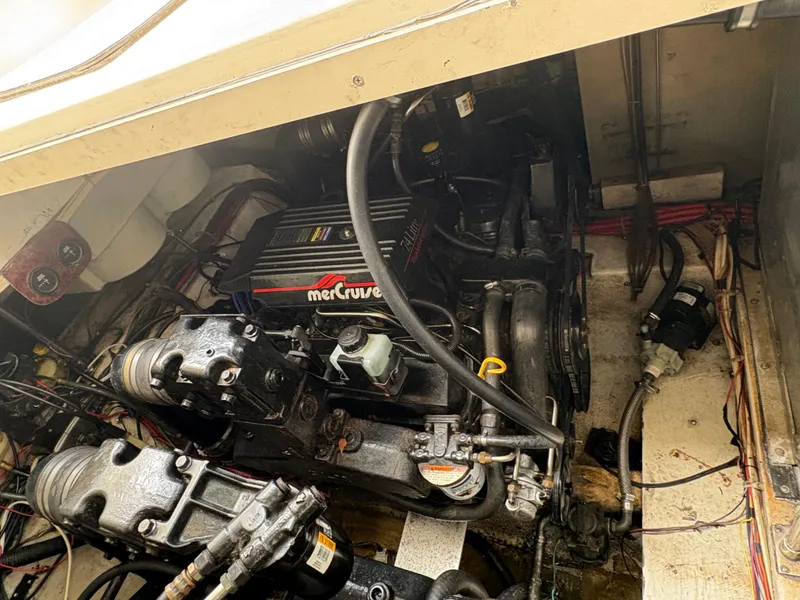 Slide: The Image of Engine compartment of a 1997 Maxum 3200 SCR boat with MerCruiser engine. - 13