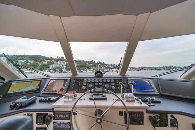 Slide: The Image of Cockpit view of 1988 Hatteras 65 Sportfish yacht with navigation instruments. - 45