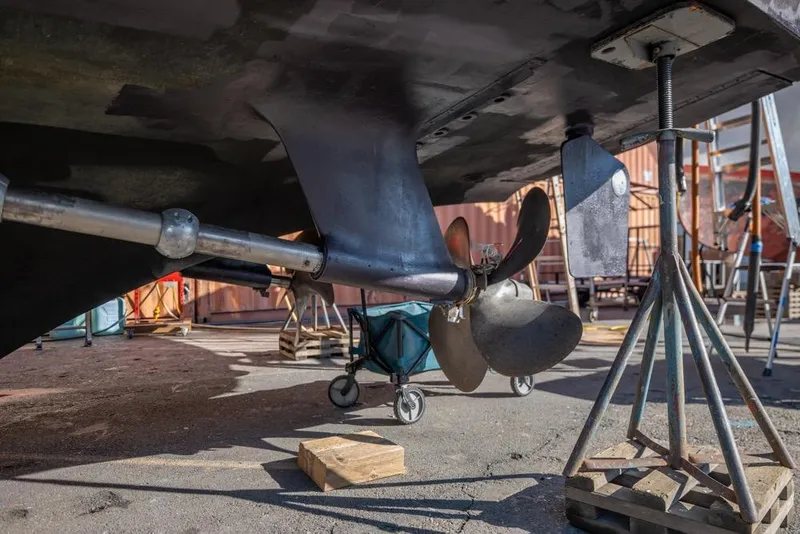 Slide: The Image of Propeller and rudder of 1988 Hatteras 65 Sportfish on dry dock. - 51
