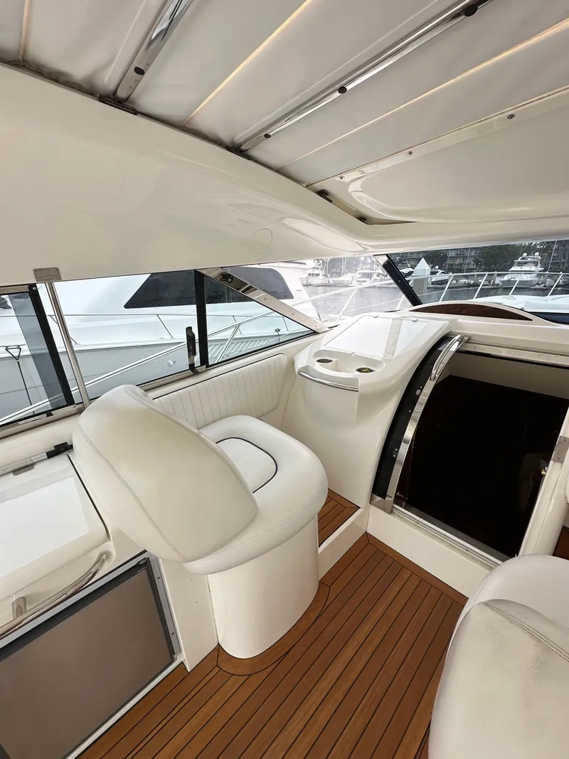 Slide: The Image of Luxurious interior of 2000 Sunseeker Predator 60 yacht with sleek design and wooden flooring. - 39