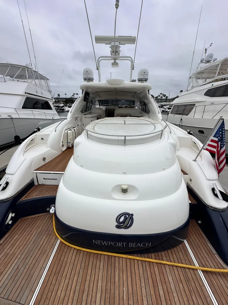 Slide: The Image of Sunseeker Predator 60 yacht, 2000 model, docked at Newport Beach marina. - 9