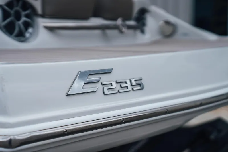 Slide: The Image of 2023 Crownline Eclipse E235 boat emblem close-up. - 32