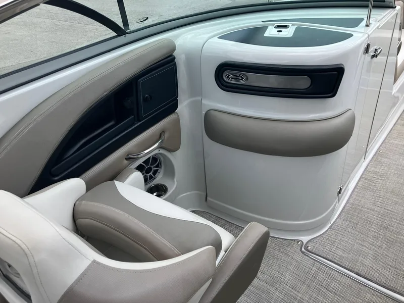 Slide: The Image of 2023 Crownline Eclipse E235 boat interior with sleek seating and modern design. - 8