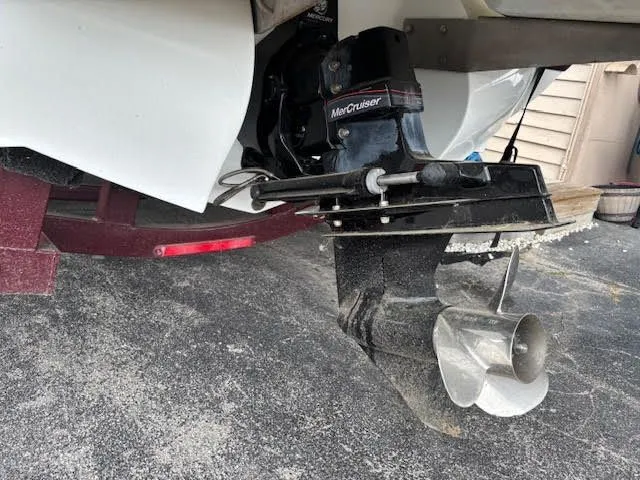 Slide: The Image of Cobalt 200 boat with MerCruiser outdrive, 2005 model, on a trailer in a driveway. - 5