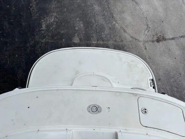 Slide: The Image of Top view of a 2005 Cobalt 200 boat deck on a concrete surface. - 9