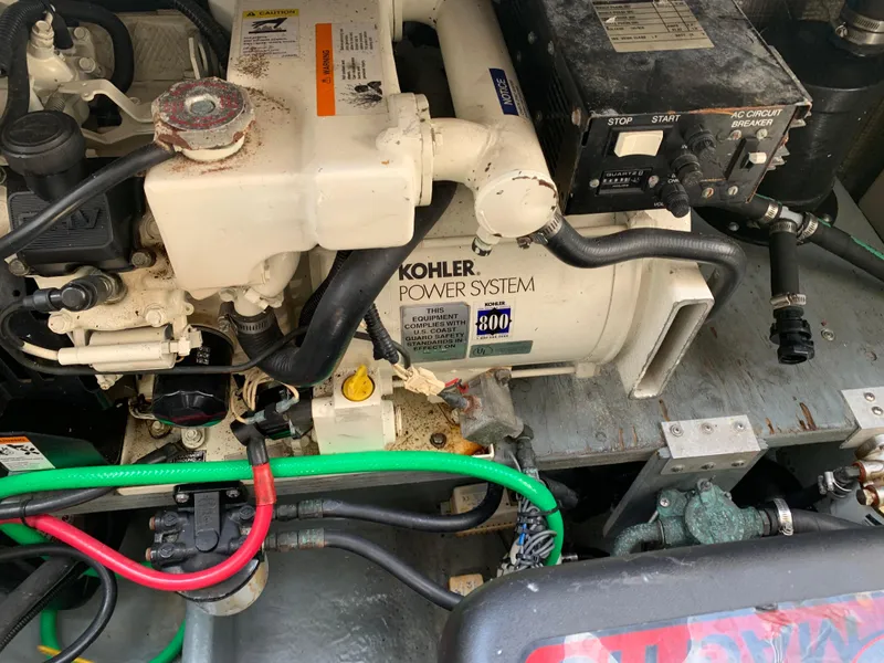 Slide: The Image of Engine compartment of a 2000 Sea Ray 270 Sundancer with Kohler power system. - 19