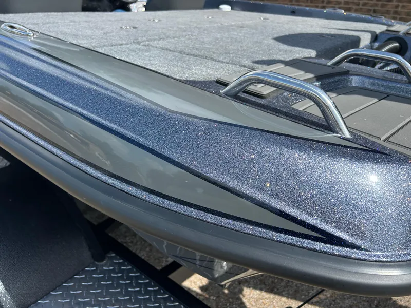 Slide: The Image of 2024 Phoenix 21 XE boat with metallic finish and sturdy handles. - 6