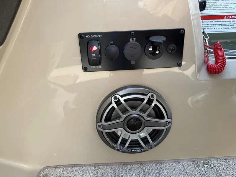 Slide: The Image of Control panel and speaker on 2025 Godfrey Monaco 235 SFL iMPACT boat. - 20