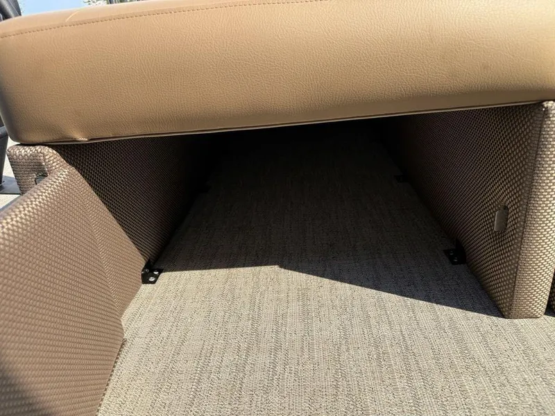 Slide: The Image of Under-seat storage area in 2025 Godfrey Monaco 235 SFL iMPACT Package boat. - 26