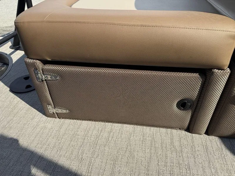 Slide: The Image of Brown storage compartment on 2025 Godfrey Monaco 235 SFL iMPACT boat seat. - 28