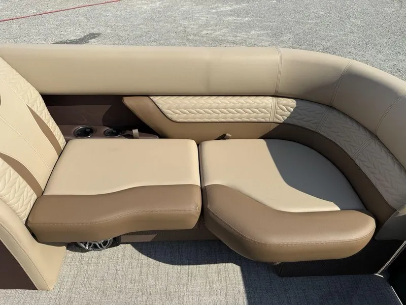 Slide: The Image of Luxurious seating on 2025 Godfrey Monaco 235 SFL iMPACT pontoon boat, featuring beige and brown upholstery. - 3