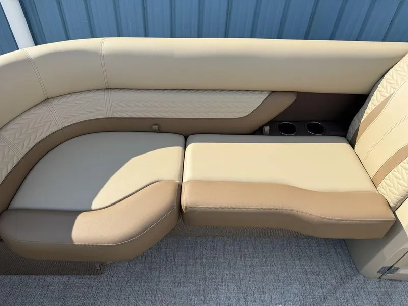 Slide: The Image of Luxurious seating on 2025 Godfrey Monaco 235 SFL iMPACT pontoon boat, beige upholstery, cup holders. - 7
