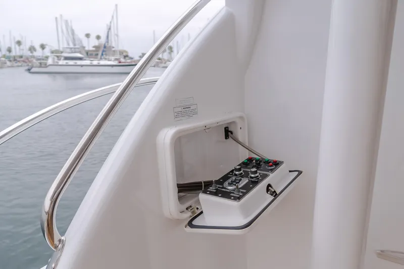 Slide: The Image of Control panel on a 2007 Hatteras 64 Motor Yacht, docked in a marina. - 40