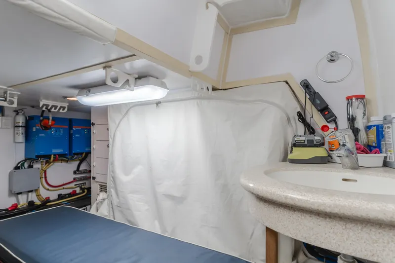 Slide: The Image of 2007 Hatteras 64 Motor Yacht interior with utility area and sink. - 44