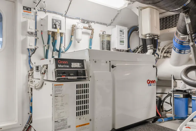 Slide: The Image of Engine room of 2007 Hatteras 64 Motor Yacht with Onan marine generator. - 47