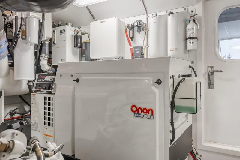 Slide: The Image of Engine room of 2007 Hatteras 64 Motor Yacht with Onan marine generator. - 48