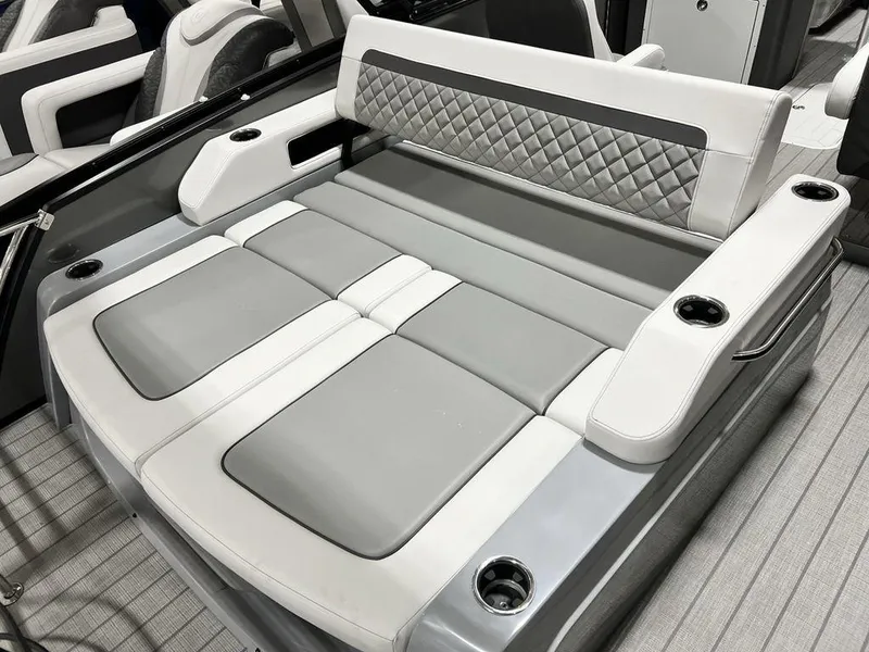 Slide: The Image of Luxurious seating on 2025 Godfrey AquaPatio 235 SFLC iMPACT pontoon boat, featuring elegant design. - 26