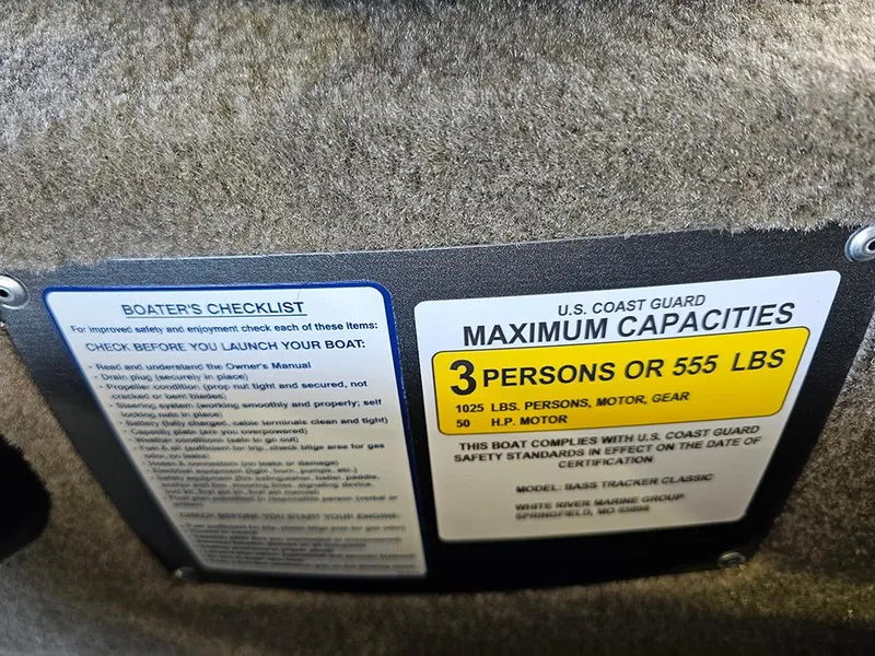 Slide: The Image of 2026 Tracker Bass Tracker Classic Limited capacity and safety checklist label. - 14