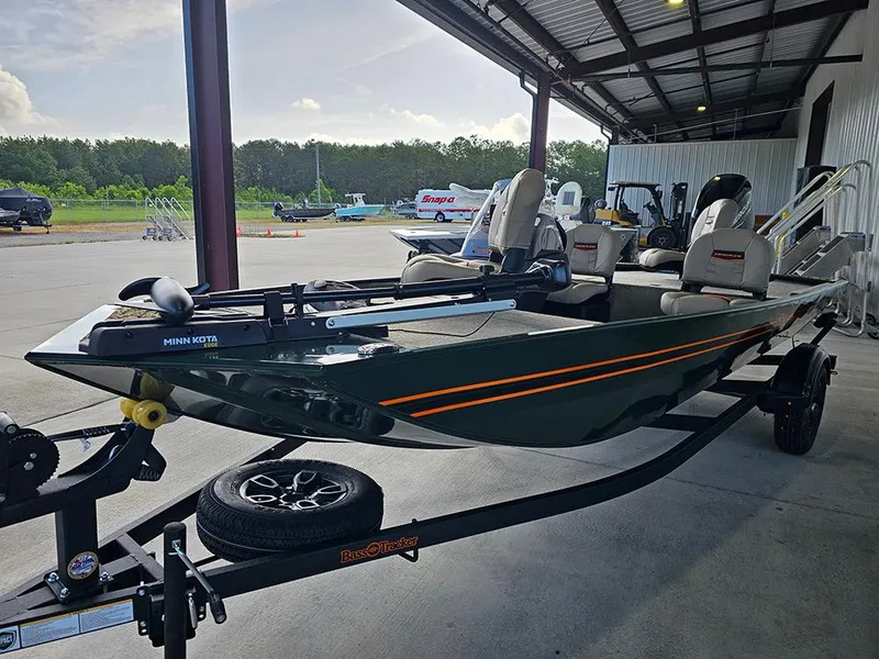 Slide: The Image of 2026 Tracker Bass Tracker Classic Limited boat on trailer in outdoor setting. - 5