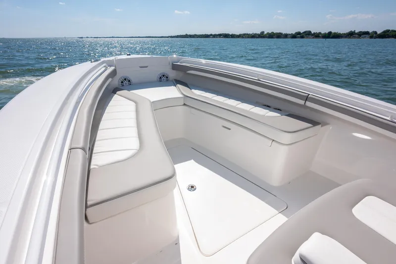 Slide: The Image of 2026 Regulator 23 boat interior with spacious seating and ocean view. - 20