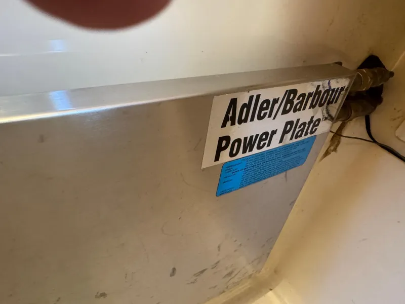 Slide: The Image of Adler/Barbour Power Plate in 1999 Hinckley Picnic boat interior. - 19