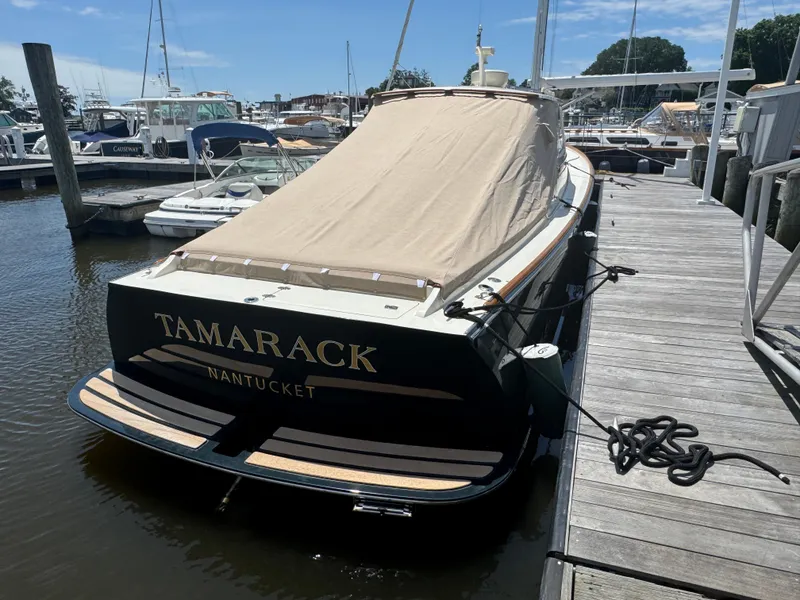 Slide: The Image of 1999 Hinckley Picnic boat "Tamarack" docked in Nantucket marina. - 6