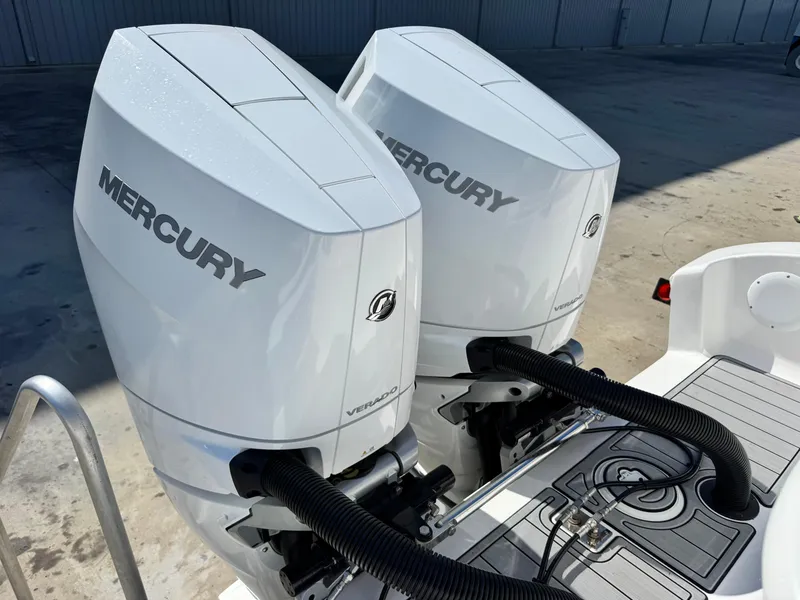 Slide: The Image of Twin Mercury Verado outboard engines on a 2025 Fountain 34 TE boat. - 22