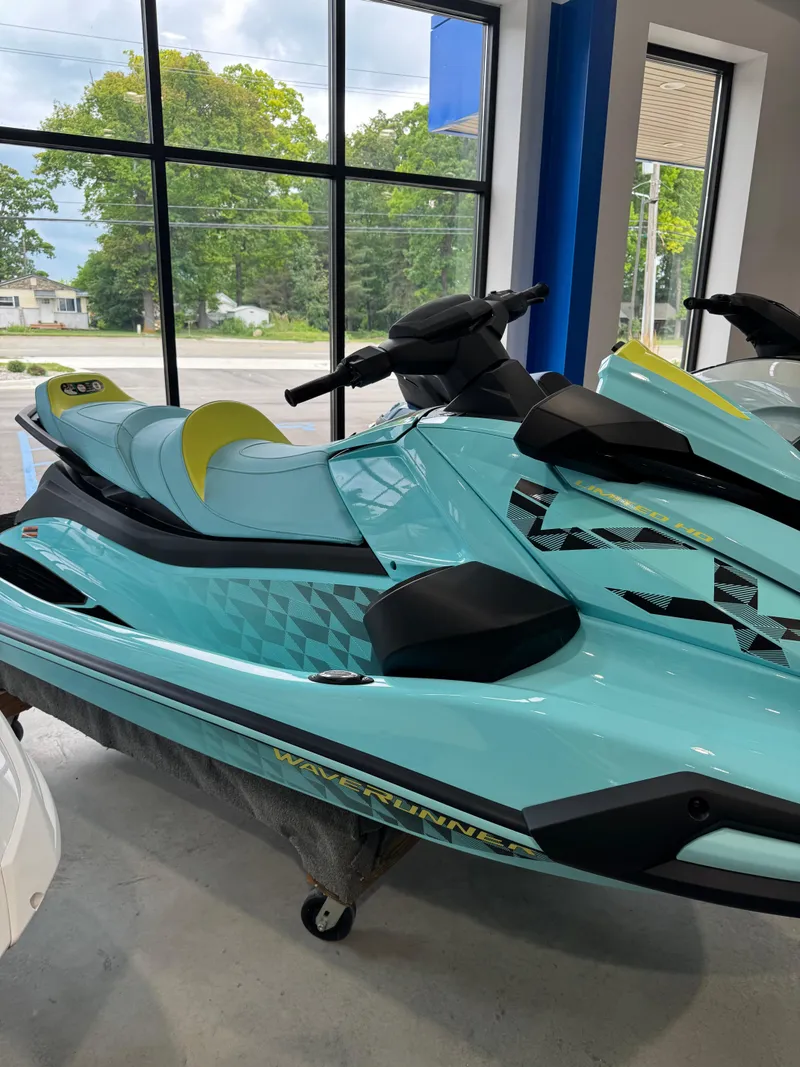 The Image of 2025 Yamaha WaveRunner VX Limited HO in showroom, turquoise with black accents. - 0