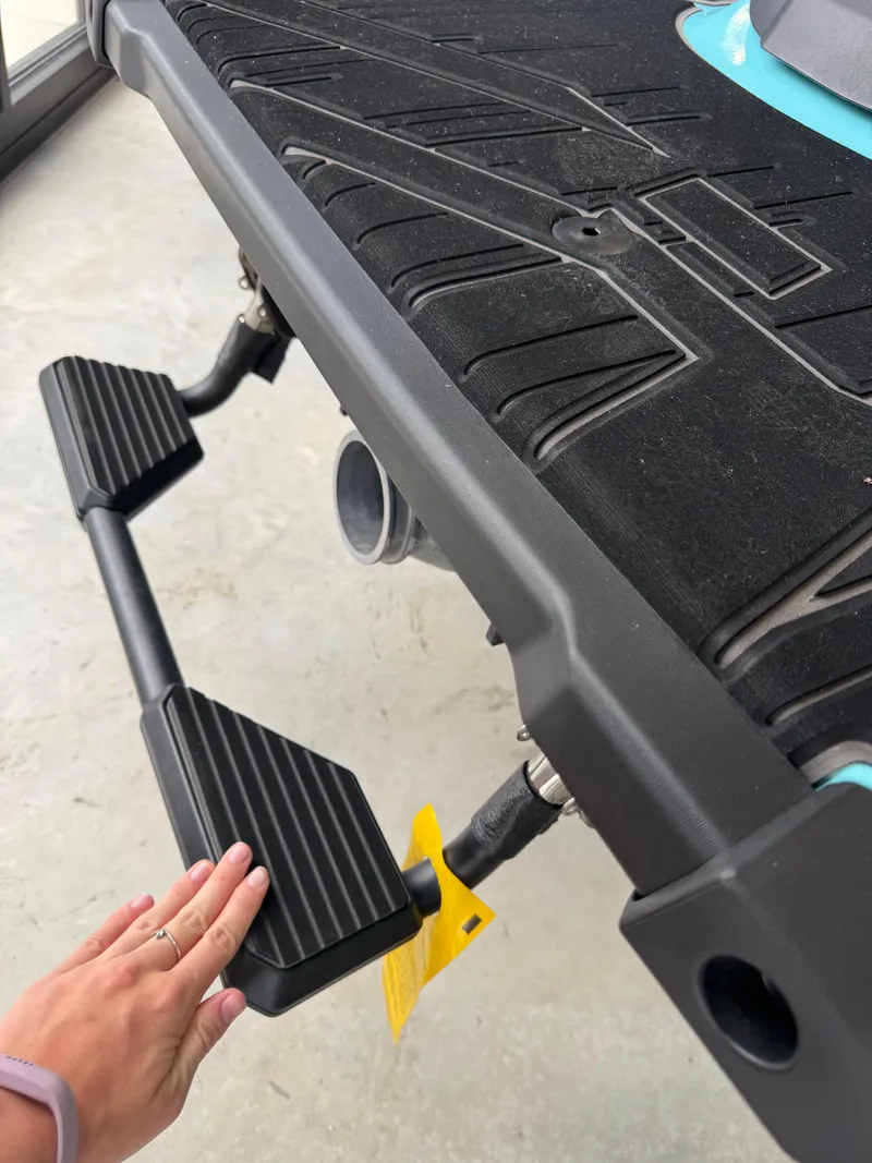 Slide: The Image of 2025 Yamaha WaveRunner VX Limited HO rear step detail with hand for scale. - 8