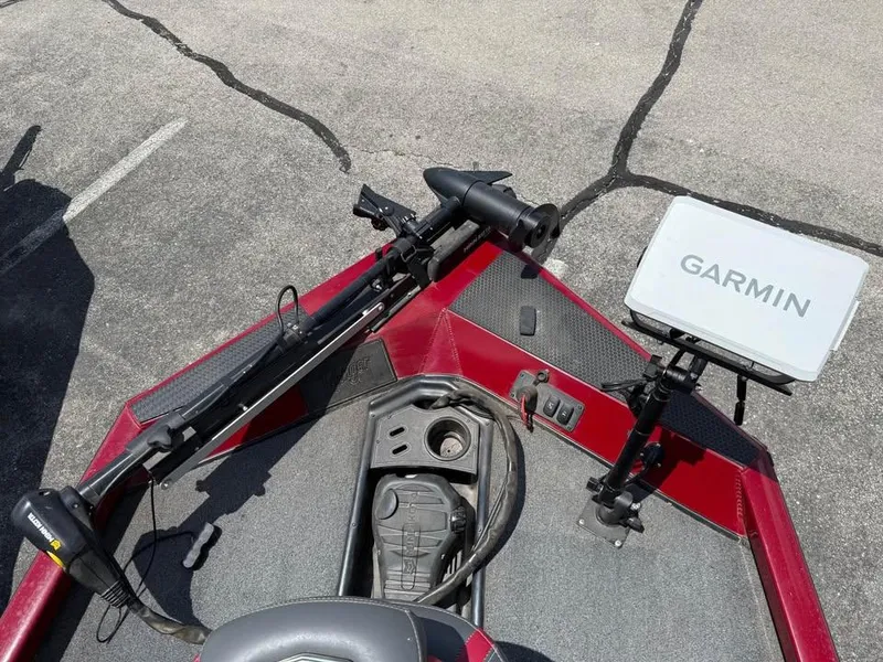 Slide: The Image of 2023 Ranger RT 188 boat with Garmin navigation system and trolling motor on deck. - 12