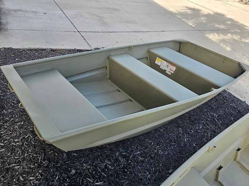 Slide: The Image of 2026 Tracker Grizzly 1036 Utility boat on display, showcasing its durable design. - 3