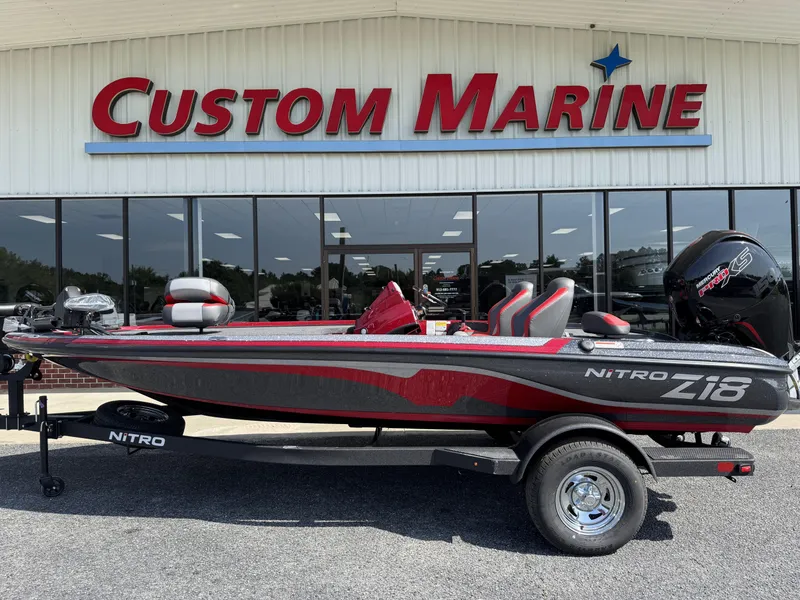 The Image of 2026 Nitro Z18 boat displayed at Custom Marine dealership. - 0