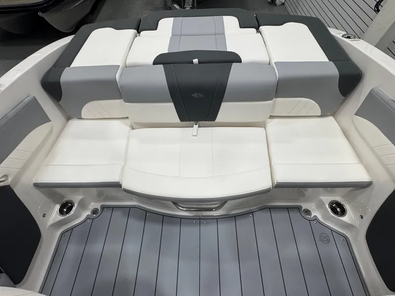 Slide: The Image of 2025 Chaparral 21 SSi boat interior with gray and white cushioned seating. - 12