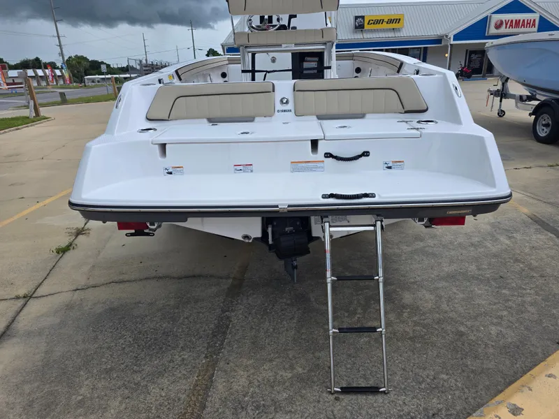 Slide: The Image of 2025 Yamaha Boats 195 FSH Sport, rear view with swim platform and ladder. - 7