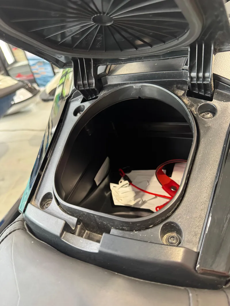 Slide: The Image of Open storage compartment of 2024 Yamaha WaveRunner GP1800R SVHO, showing interior details. - 4