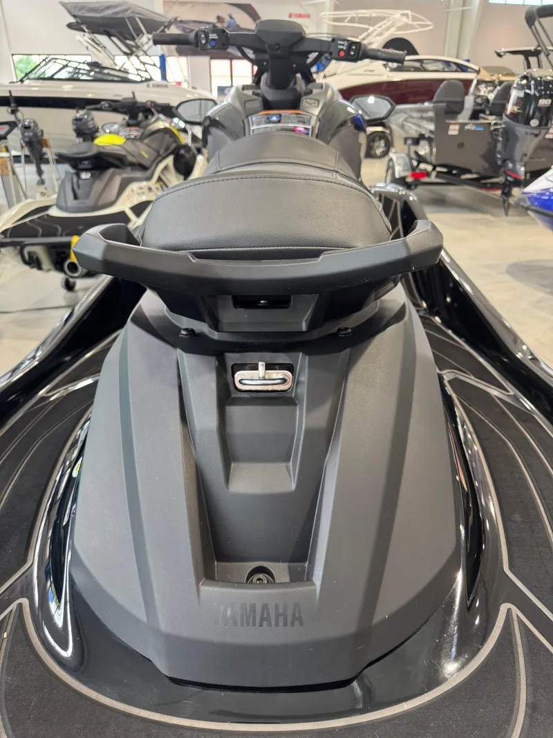 Slide: The Image of 2024 Yamaha WaveRunner GP1800R SVHO jet ski, black, displayed in showroom. - 6