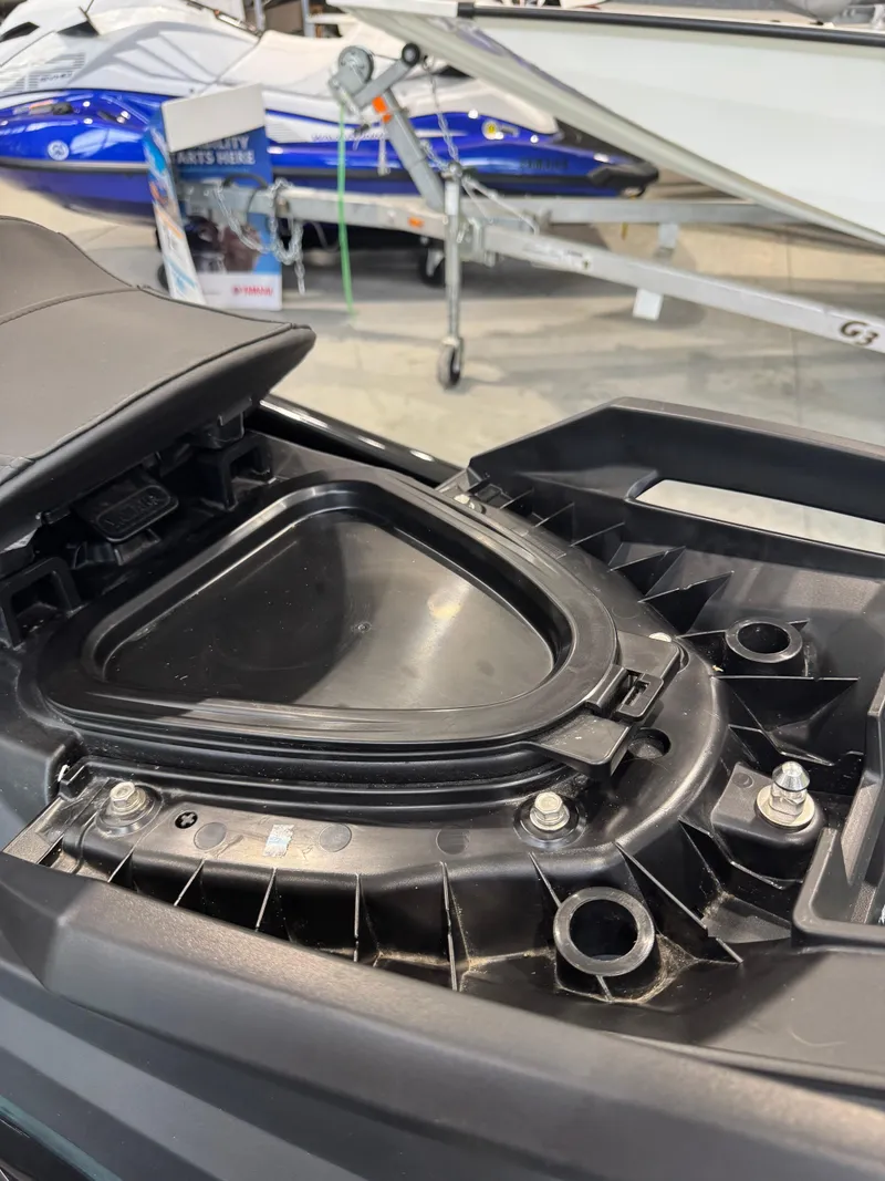 Slide: The Image of 2024 Yamaha WaveRunner GP1800R SVHO storage compartment detail in showroom. - 7