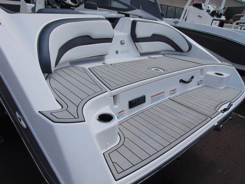 Slide: The Image of 2020 Yamaha Boats 195S swim platform with cushioned seating and cup holders. - 5