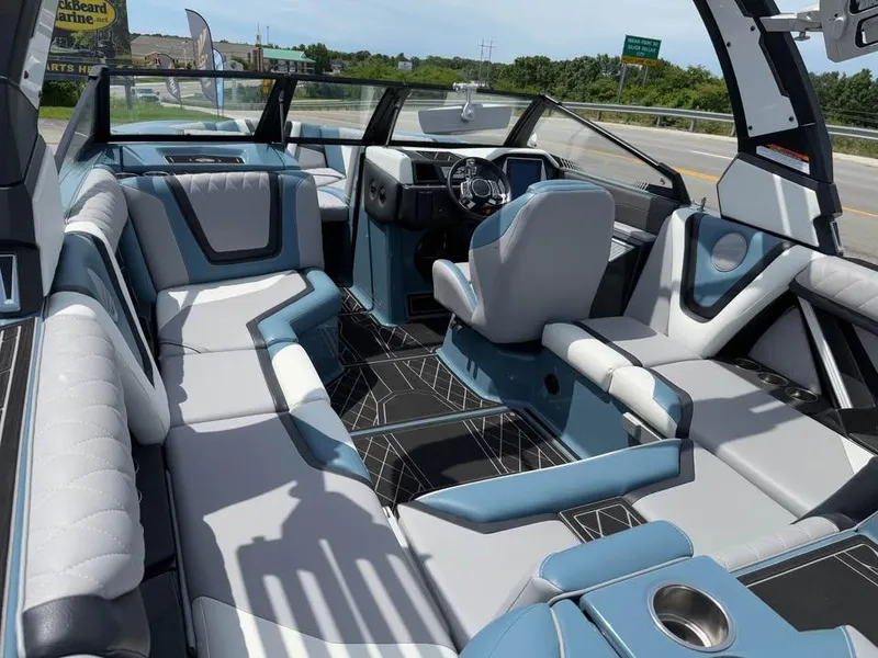 Slide: The Image of 2022 Tigé 21ZX boat interior with modern seating and sleek design. - 8